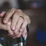 person holding black and silver microphone
